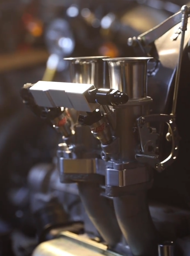 Close-up of vintage car engine hardware