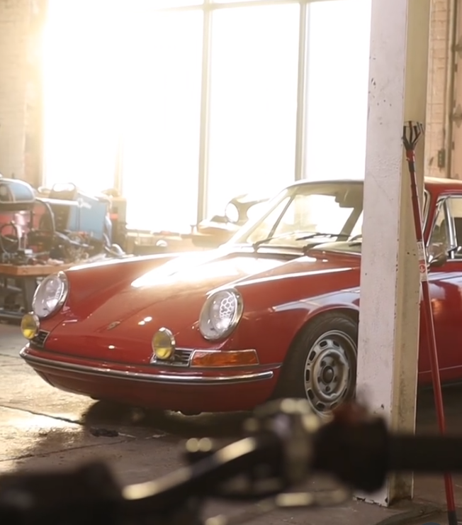 Classic red Porsche 912 in a workshop